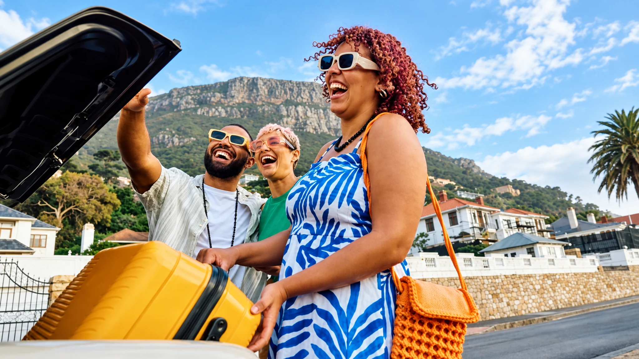 Friends laughing together as they arrive for a trip