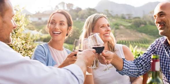 Friends enjoying a relaxed wine outing together