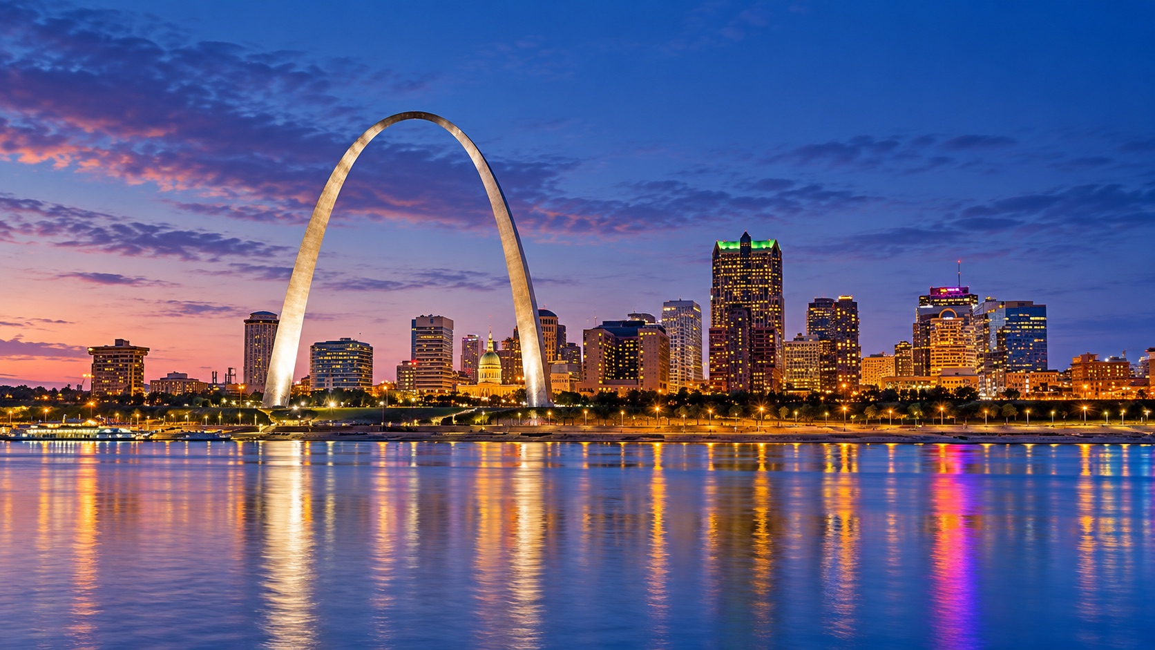 The St. Louis skyline and Gateway Arch at blue hour